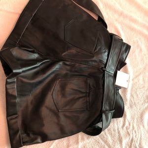 All you need is your crop leather looking shorts